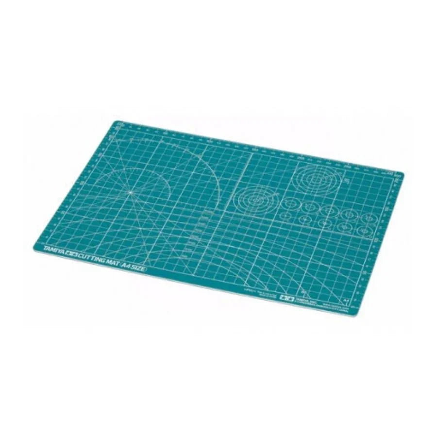 Tamiya A4 size self-healing cutting mat for model kits and crafts, featuring grid lines and measurement guides