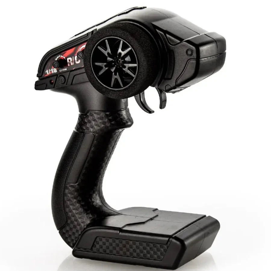 Black RC car remote control with 1/18 scale grip and wheel design for hobby racing