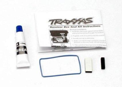 Traxxas Receiver Box Seal Kit with grease, O-ring, and instructions for RC car maintenance