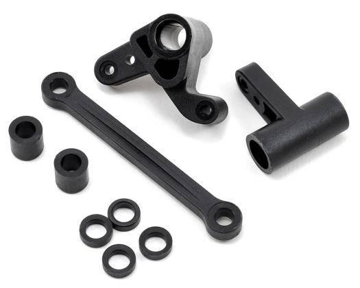 Black RC car suspension parts, arms, bushings, and washers for model assembly