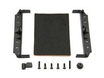 Black RC car chassis parts, foam pad, screws, and hardware kit for model assembly