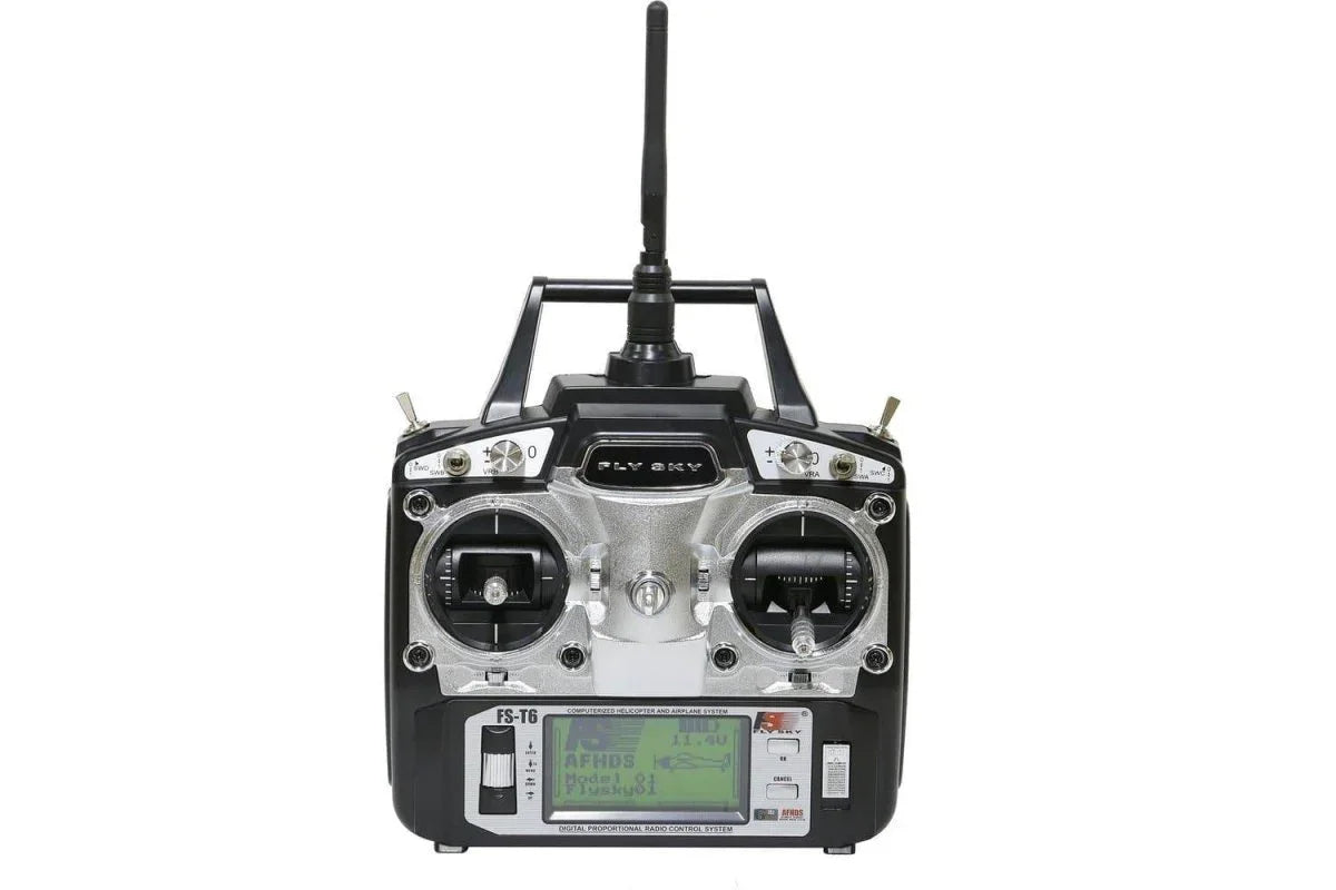 FlySky FS-T6 radio controller for RC helicopters and planes, featuring dual joysticks and digital display