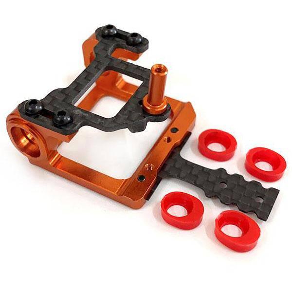 Orange and black RC car chassis with red rubber grommets for model kit assembly
