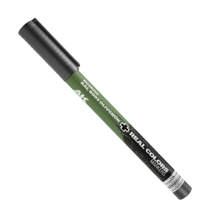 Close-up of AK Interactive RAL 6003 Olivgrun Acrylic Paint Marker AKRCM015, designed for scale model detailing and camouflage applications.