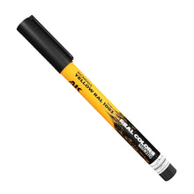 Close-up of AK Interactive Real Colors Marker Yellow RAL 1003 acrylic paint marker for scale modelling and hobby use.