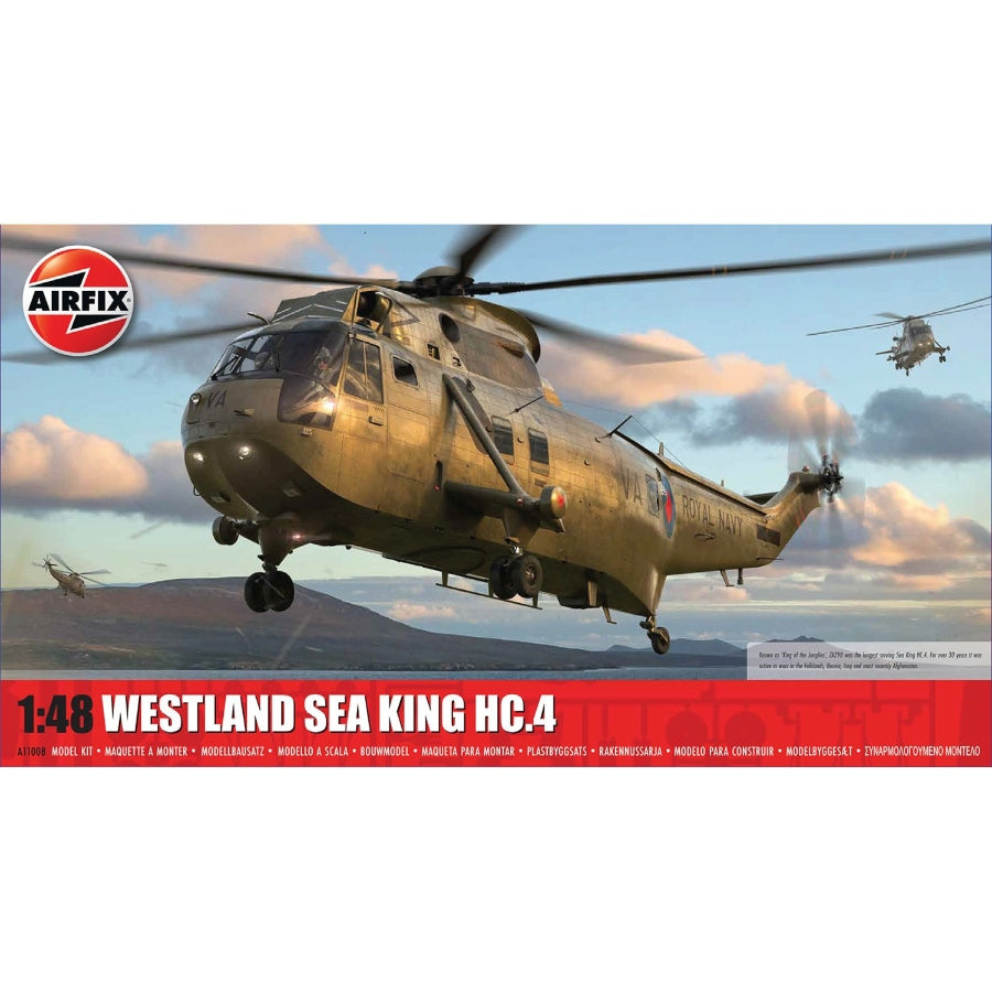 Airfix 1:48 Westland Sea King HC.4 model assembled in olive-drab Royal Navy Commando livery with open side door and folded main rotor blades