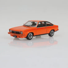 DDA 1:24 Holden LX SS Torana orange 6 cylinder diecast model car.