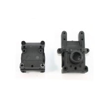 Black plastic model kit parts for RC car or drone assembly, featuring mounting holes and gear housing