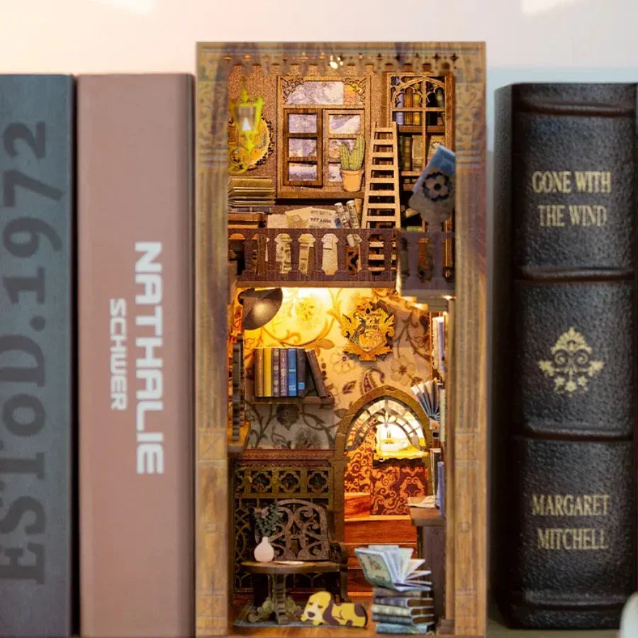 Miniature bookshelf diorama with cozy lit interior, perfect for model kit collectors and hobby enthusiasts