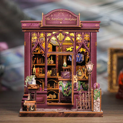 Astrology bookshop DIY book nook kit with purple facade, books, and mystical decor