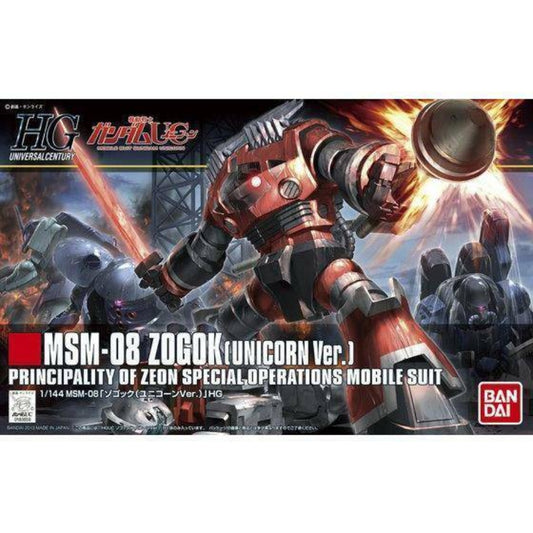 Bandai HGUC 1/144 Zogok (Unicorn Ver.) model kit showcasing its distinctive red and black color scheme, equipped with a heat saber and boomerang cutters, posed dynamically against a neutral background.