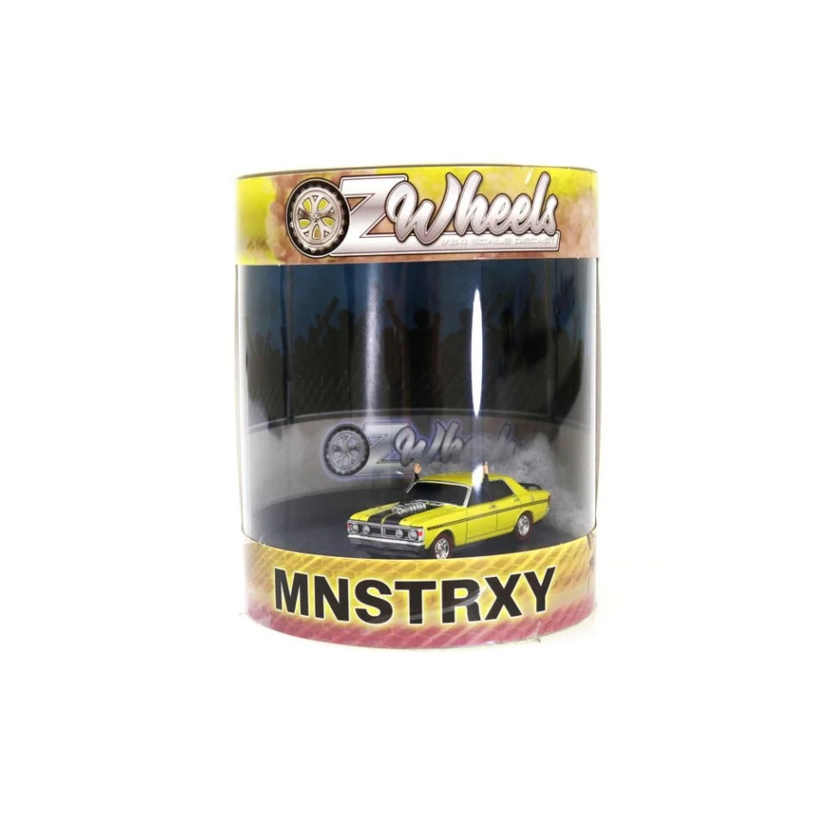 Oz Wheels Monster XY Falcon Skid in Cylinder – 1:64 scale die-cast Australian muscle car model in display cylinder, featuring burnout smoke effect.