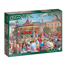 Falcon de luxe 1000-piece puzzle 'The Bandstand' by Victor McLindon, featuring a lively park concert scene with crowd and brass band.
