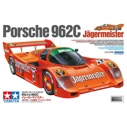 Tamiya 1:24 Porsche 962C Jägermeister kit box and assembled model in bright orange Brun Motorsport livery