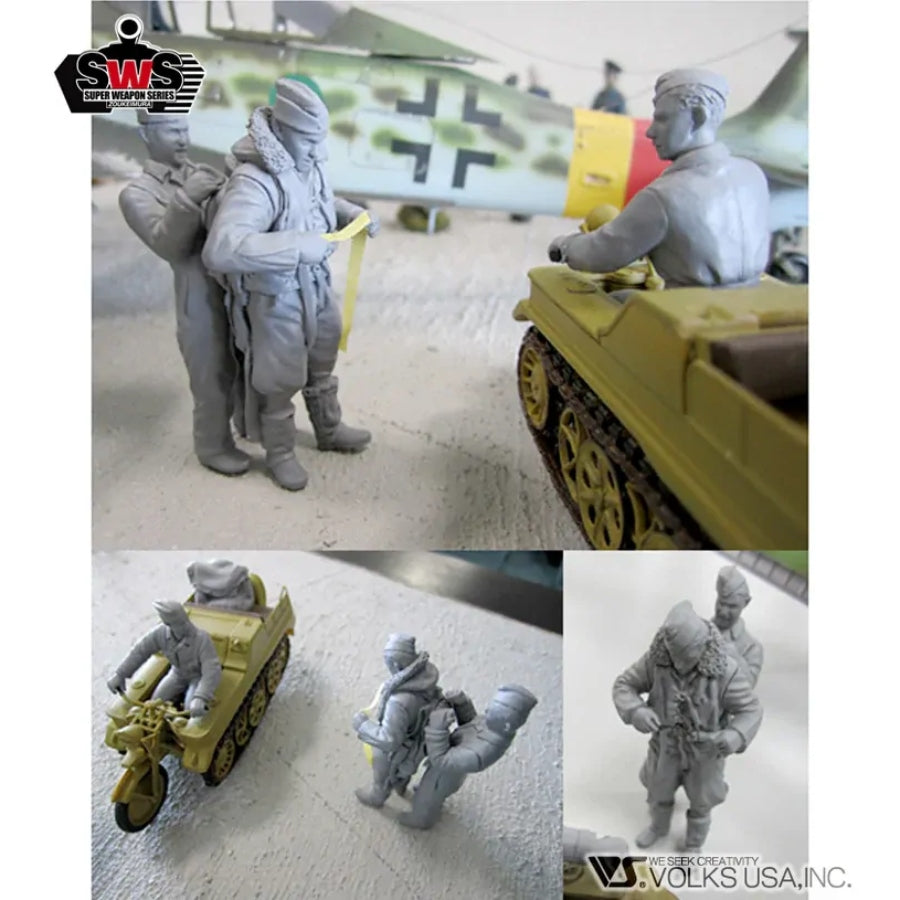 Unpainted resin figures for 1/32 Kettenkrad boarding preparation: driver, mechanic, pilot figures posed beside Kettenkrad
