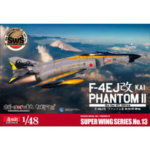 Zoukei‑Mura 1/48 F‑4EJ Kai Phantom II J.A.S.D.F. kit showing clear and grey sprues, detailed cockpit and “Phantom Forever” scheme