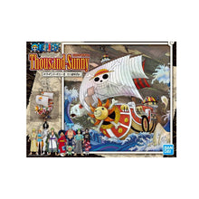 Bandai Thousand Sunny New World Version One Piece model kit featuring detailed Straw Hat Pirates ship from the anime, with vibrant colours and intricate parts.