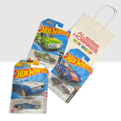 Assorted Hot Wheels basic cars in the 3 Pack Christmas bundle