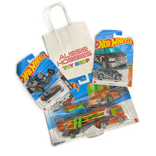 Hot Wheels Super Rig hauler with 2 basic die-cast cars bundle