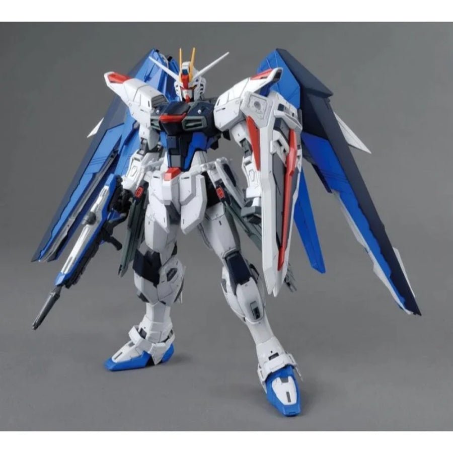 Bandai MG 1/100 Freedom Gundam Ver.2.0 (G5061611) – detailed Master Grade Gundam SEED model kit with weapons and wings.