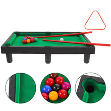 Miniature pool table set with balls, cues, and triangle on a white background