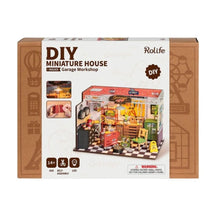 Rolife Garage Workshop DG165 miniature DIY kit with wooden tools, bike, and detailed furniture parts
